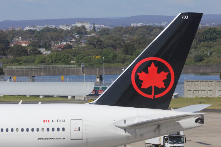 Air Canada Laying Off Half of Employees