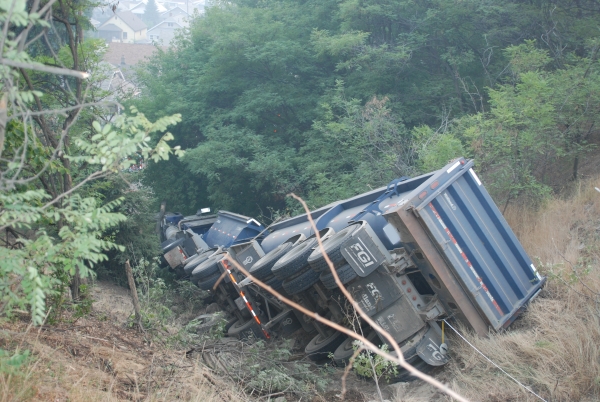 One man dead following tractor-trailer crash in Trail