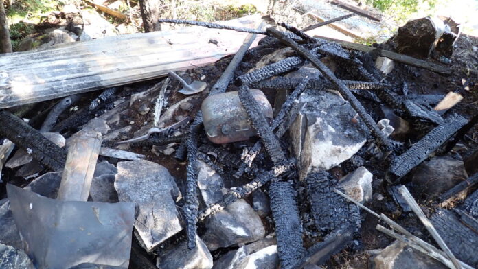 This is a photo of a homeless camp west of Nelson that caught fire